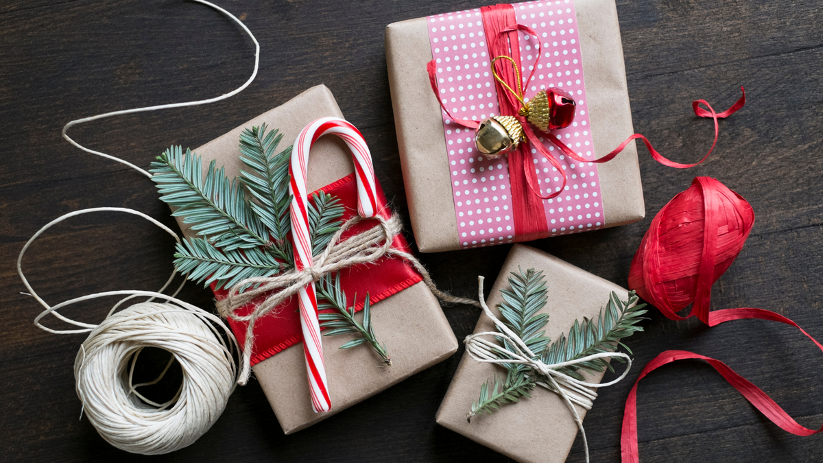 wrapped holiday gifts with ribbons for NICU parents